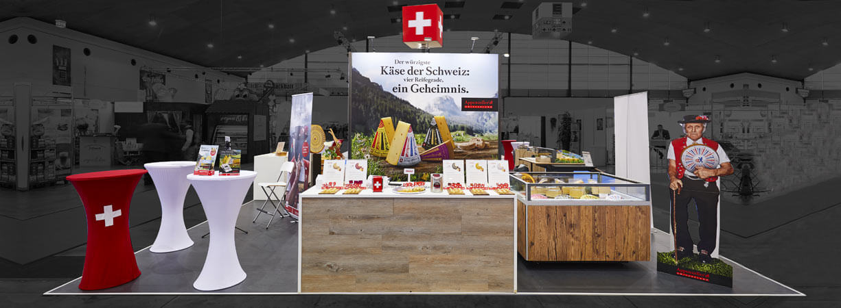 Plus-Messestand